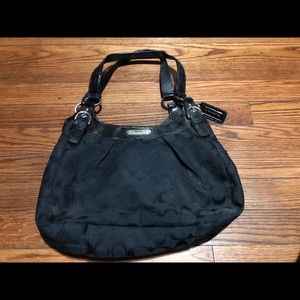 Black coach hand bag